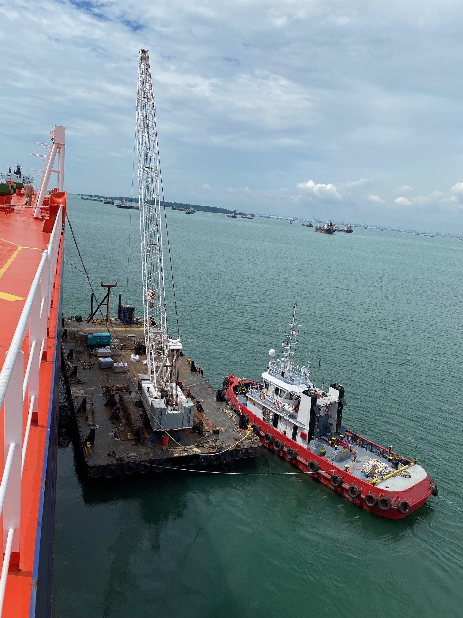 Crane barge for tools delivery
